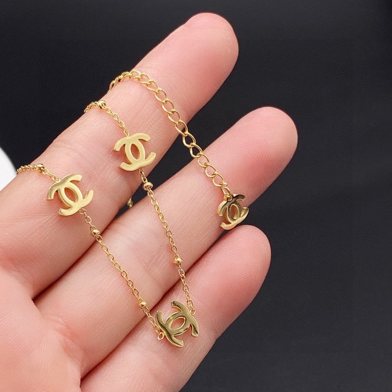 18K  Chanel Small Logo Gold Necklace