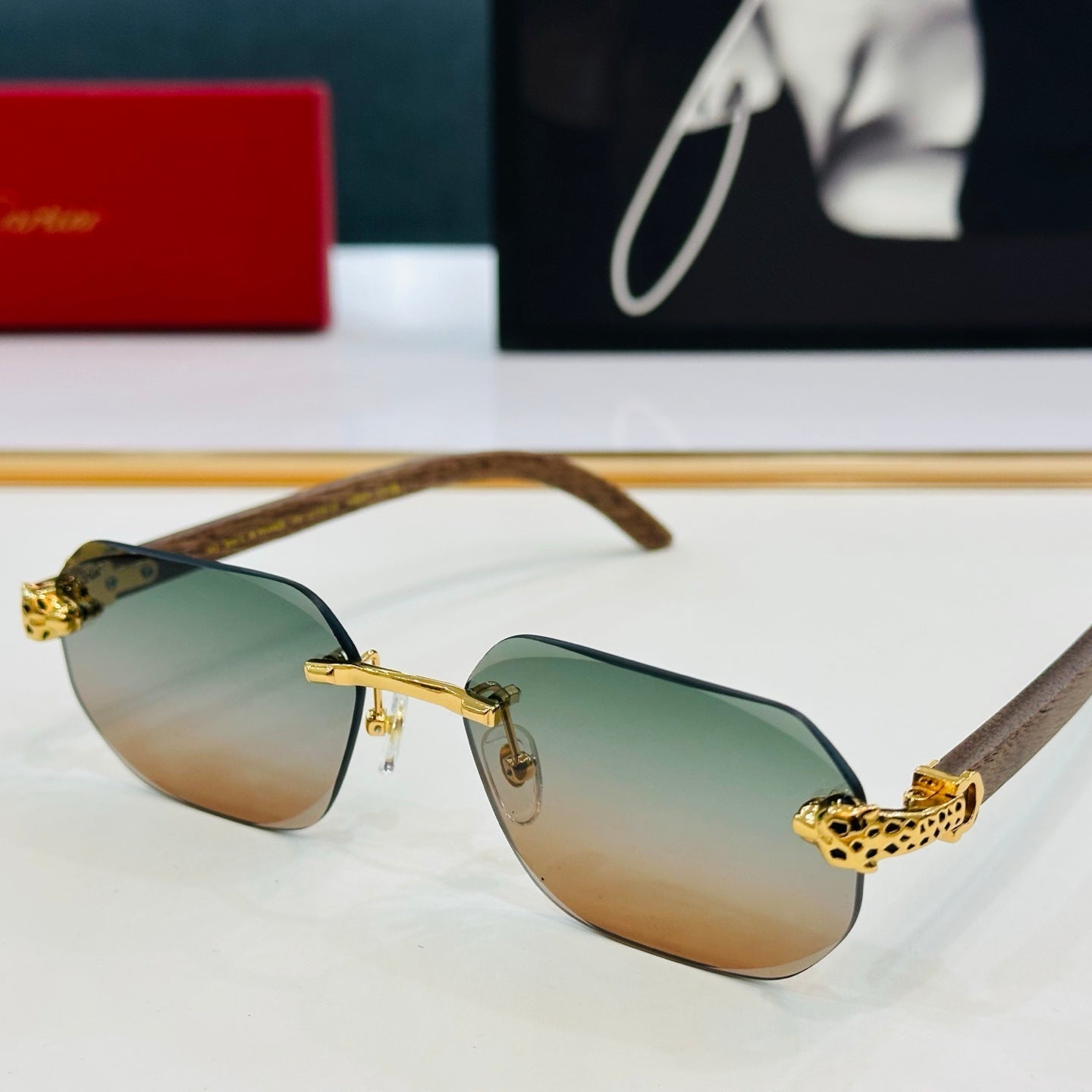 PANTHÈRE RIMLESS OVAL FRAME SUNGLASSES 543637 IN METAL